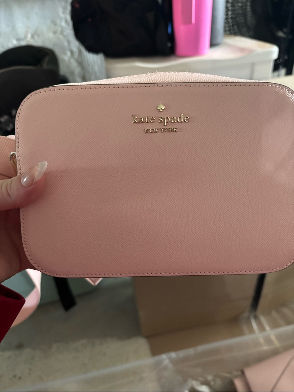 kate spade light pink crossbody bag with gold logo